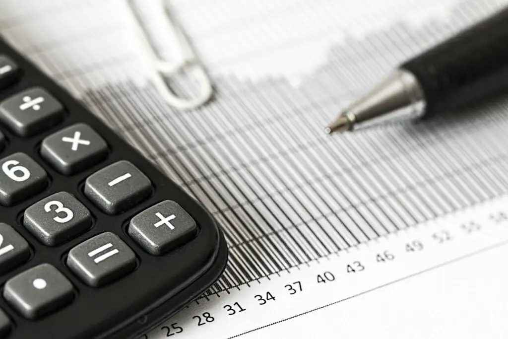 Closeup calculator and pen
